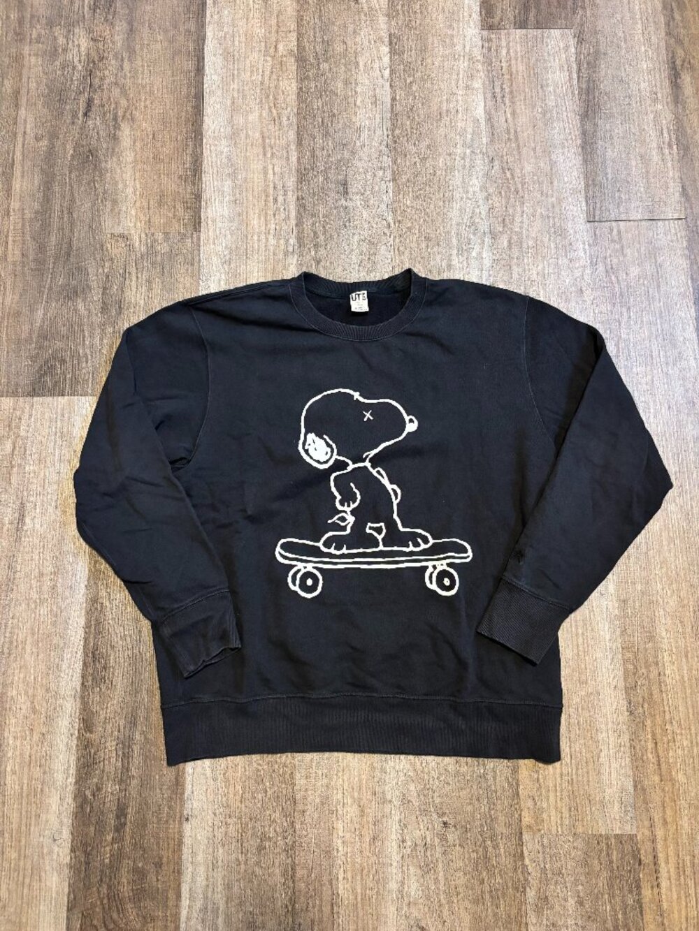 Uniqlo x Kaws x Peanuts 'Snoopy Skateboarding' Crewneck Sweatshirt